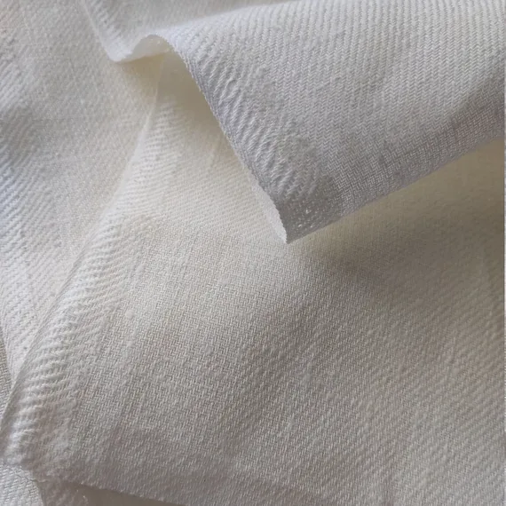 Close-up of a woven white cotton fabric